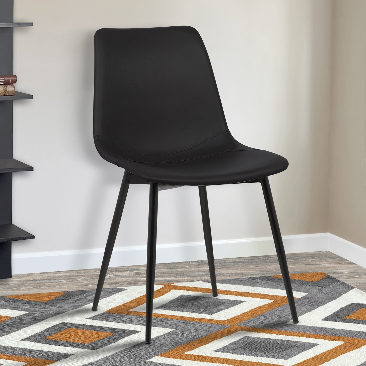 Monte Contemporary Dining Chair in Black Faux Leather with Black Metal Legs